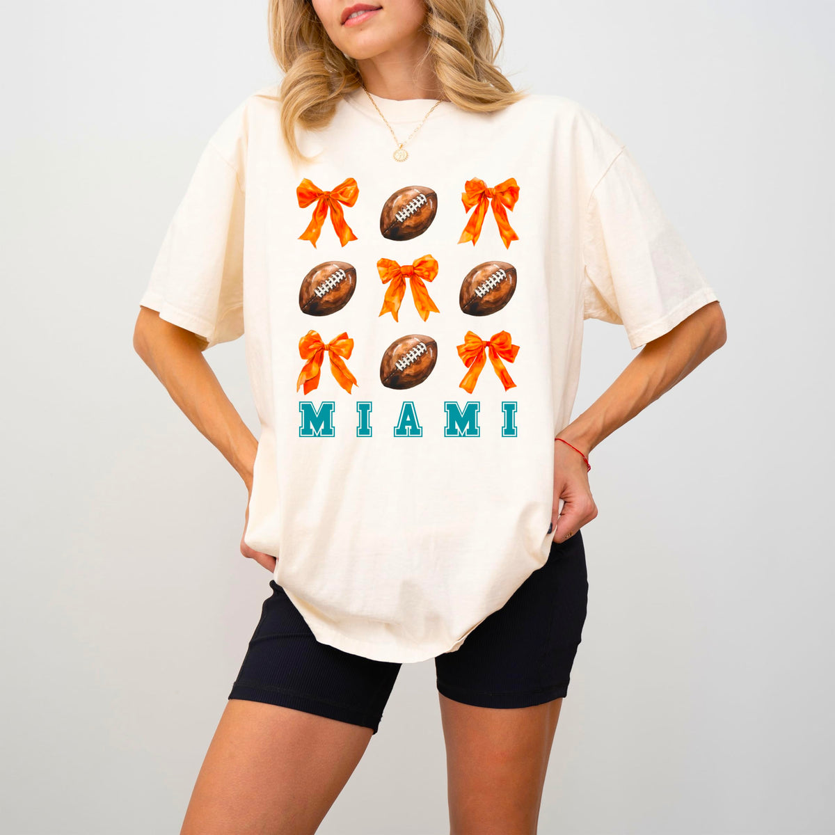 Trendy Miami Football Shirt for Women and Teens Girly Orange Bows and Footballs Florida Team Tee